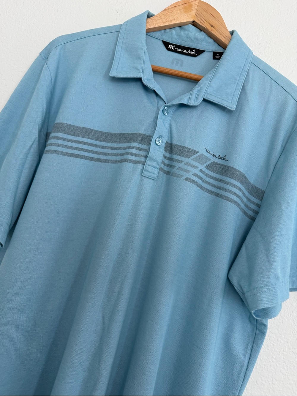 Travis Mathew Sky Blue Polo with Gray Chest Stripe